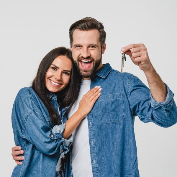 Homeowners.,Happy,Young,Caucasian,Couple,Spouses,Wife,And,Husband,Holding